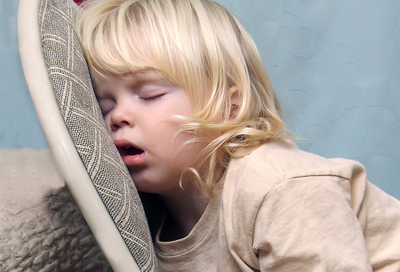 kids bedroom ideas child asleep on chair good sleep expert